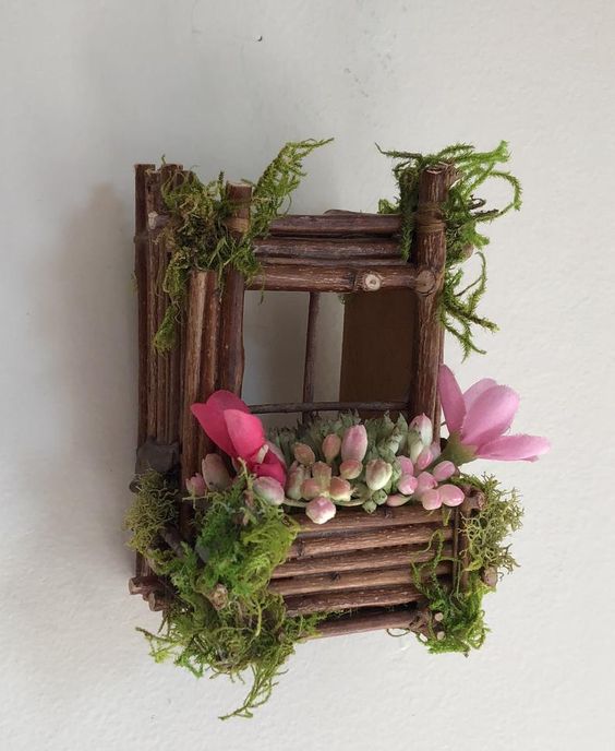Inspirace na jarní tvoření: Vyrobte si toto přírodní okénko z klacíků a rostlin!