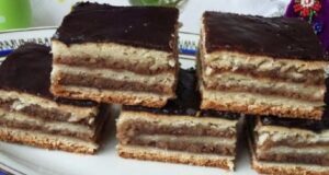 Recept na ořechový koláč s čokoládovou polevou a džemem