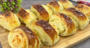 Slané šneky se sýrovou náplní, posypané mákem – vyzkoušejte je! Nadýchané, velmi měkké a jemné slané šneky se sýrovou náplní, posypané mákem - vyzkoušejte je!