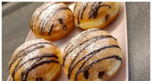 Domácí koblížky s Nutellou: Nadýchané obláčky, které se rozplývají na jazyku Domácí koblížky s Nutellou