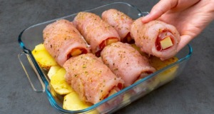 Zapečené brambory a plněné kuřecí rolky se slaninou a sýrem s jemným salátem Zapečené brambory a plněné kuřecí rolky se slaninou a sýrem s jemným salátem