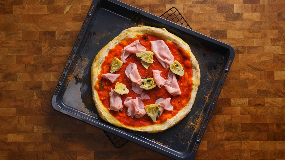 Pizza Capricciosa - dokonalé spojení šunky, hub, artyčoků a mozzarelly