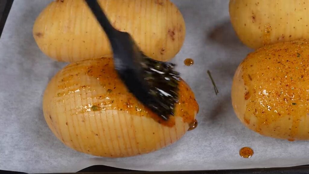 Crispy and golden fan-shaped potatoes filled with ham and cheese