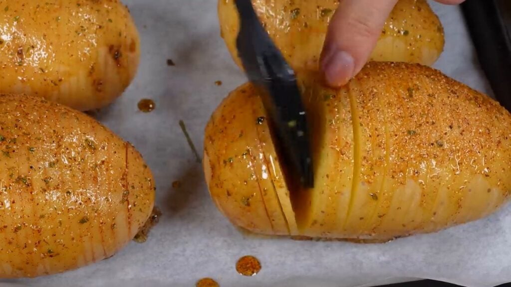 Crispy and golden fan-shaped potatoes filled with ham and cheese