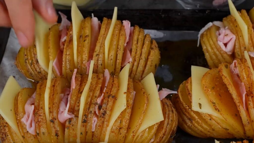 Crispy and golden fan-shaped potatoes filled with ham and cheese