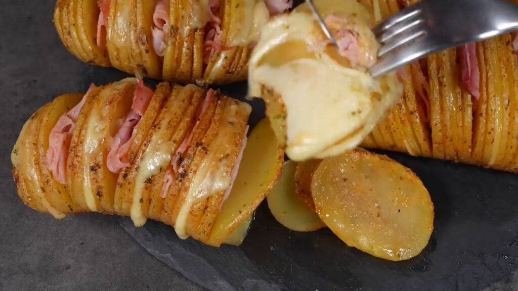 Crispy and golden fan-shaped potatoes filled with ham and cheese