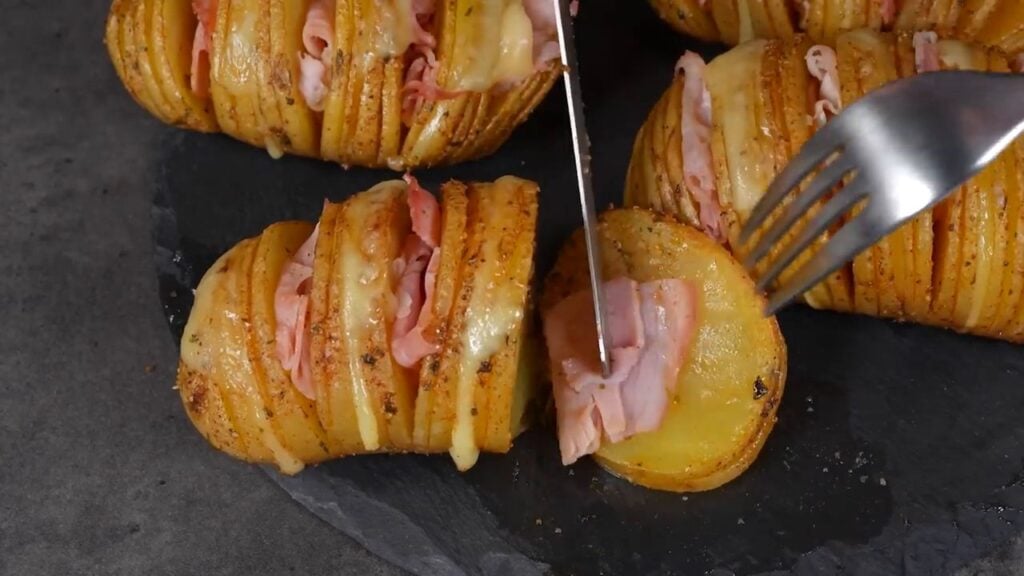 Crispy and golden fan-shaped potatoes filled with ham and cheese