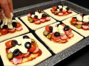 Rychlé pizza taštičky pro návštěvy: Jak připravit křupavé pohoštění za pár minut Křehké pizza taštičky z listového těsta plněné klobásou, okurkou, cherry rajčátky, taveným sýrem a černými olivami - Ideální slané občerstvení pro návštěvy!