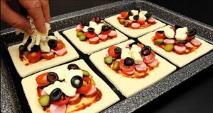 Křehké pizza taštičky z listového těsta plněné klobásou, okurkou, cherry rajčátky, taveným sýrem a černými olivami - Ideální slané občerstvení pro návštěvy!