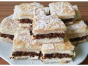 Ořechové řezy s listovým těstem: Luxusní dezert s krémem a ořechovou vrstvou Ořechové řezy s listovým těstem: Luxusní dezert s krémem a ořechovou vrstvou