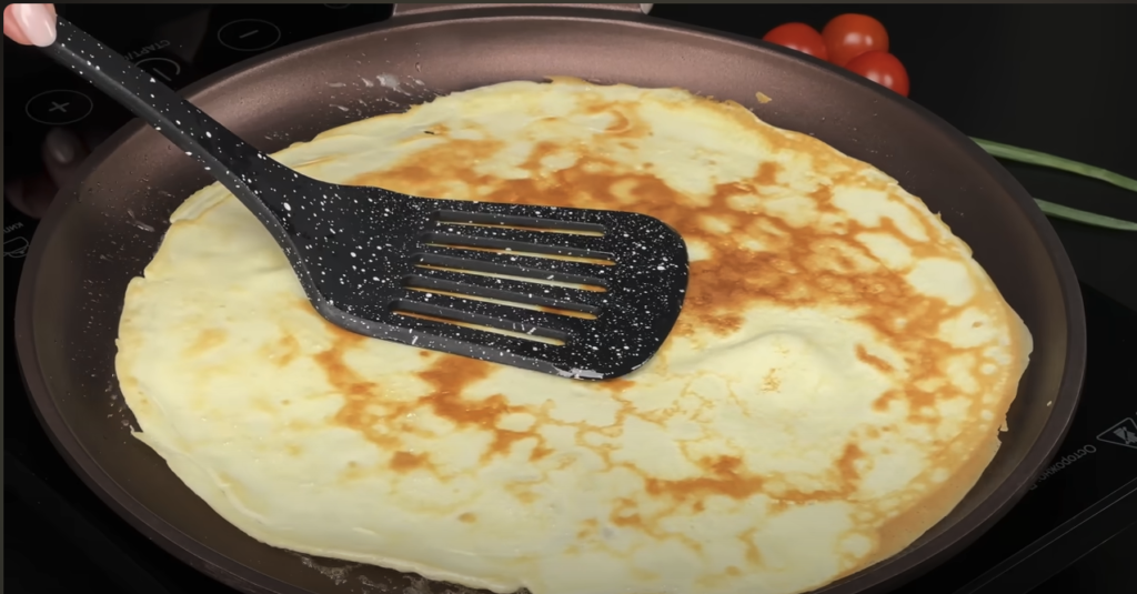 Netradiční palačinkové lasagne s bešamelem, mletým masem a sýrem