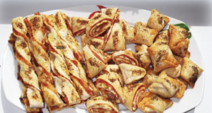 Křupavé pizza spirálky z listového těsta s česnekem, sýrem a šunkou: Ideální pohoštění 🍕✨ Lahodné křupavé pizza spirálky z listového těsta s česnekem, sýrem a šunkou: Ideální pohoštění pro každou příležitost