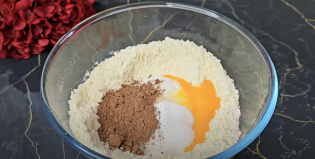 Půvabné kakaové šišky ze zakysané smetany, plněné sladkou ořechovou náplní a provoněné jemnou vanilkou - ideální pro každou příležitost