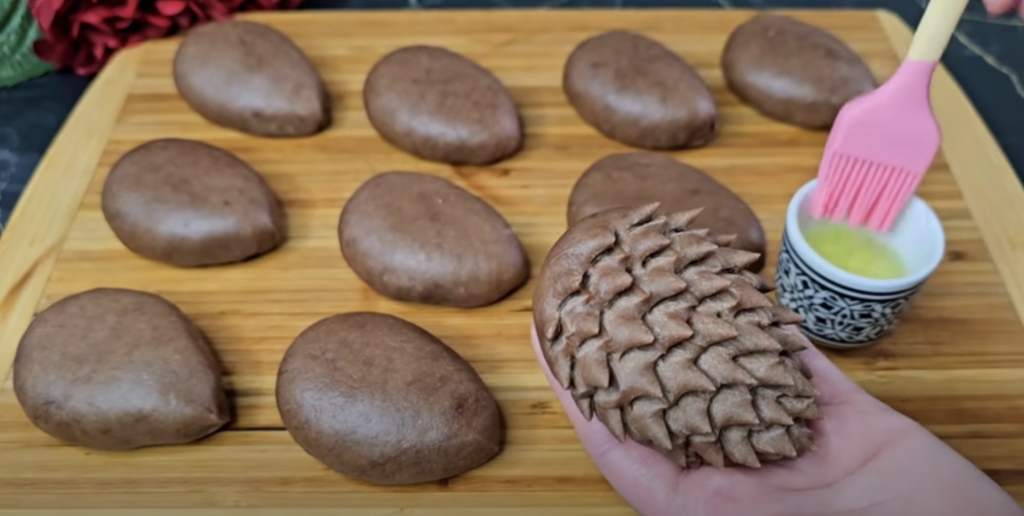 Půvabné kakaové šišky ze zakysané smetany, plněné sladkou ořechovou náplní a provoněné jemnou vanilkou - ideální pro každou příležitost