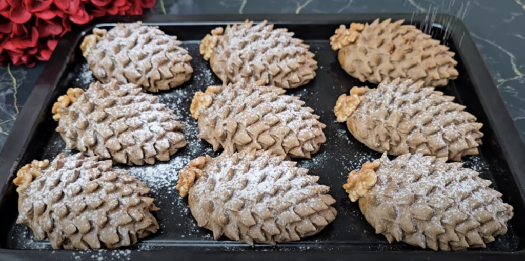 Půvabné kakaové šišky ze zakysané smetany, plněné sladkou ořechovou náplní a provoněné jemnou vanilkou - ideální pro každou příležitost