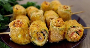Recept na cuketové roládky se sýrem Philadelphia a šunkou z trouby Cuketové roládky se sýrem Philadelphia a šunkou na špejli - rychlý a křupavý snack