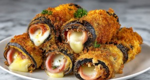 Pečené lilkové rolky s mozzarellou, šunkou a parmazánovou krustou – lehký recept s vůní Itálie Pečené lilkové rolky s mozzarellou, šunkou a parmazánovou krustou – lehký recept s vůní Itálie