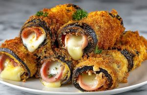 Pečené lilkové rolky s mozzarellou, šunkou a parmazánovou krustou – lehký recept s vůní Itálie