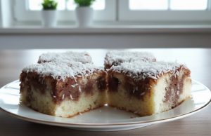 Píchaná kefírová buchta: Neuvěřitelně vláčný moučník, který si získá každého Píchaná kefírová buchta s kakaovou polevou a kokosem: vláčný moučník, který nikdy není suchý