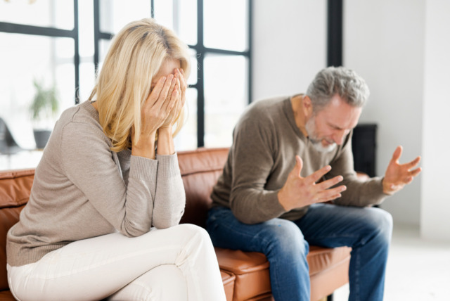 Matured couple is close to divorce. Home abuse concept